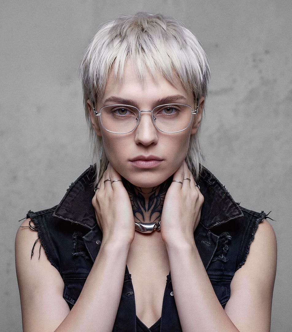 Lady wearing silver metal eyeglasses