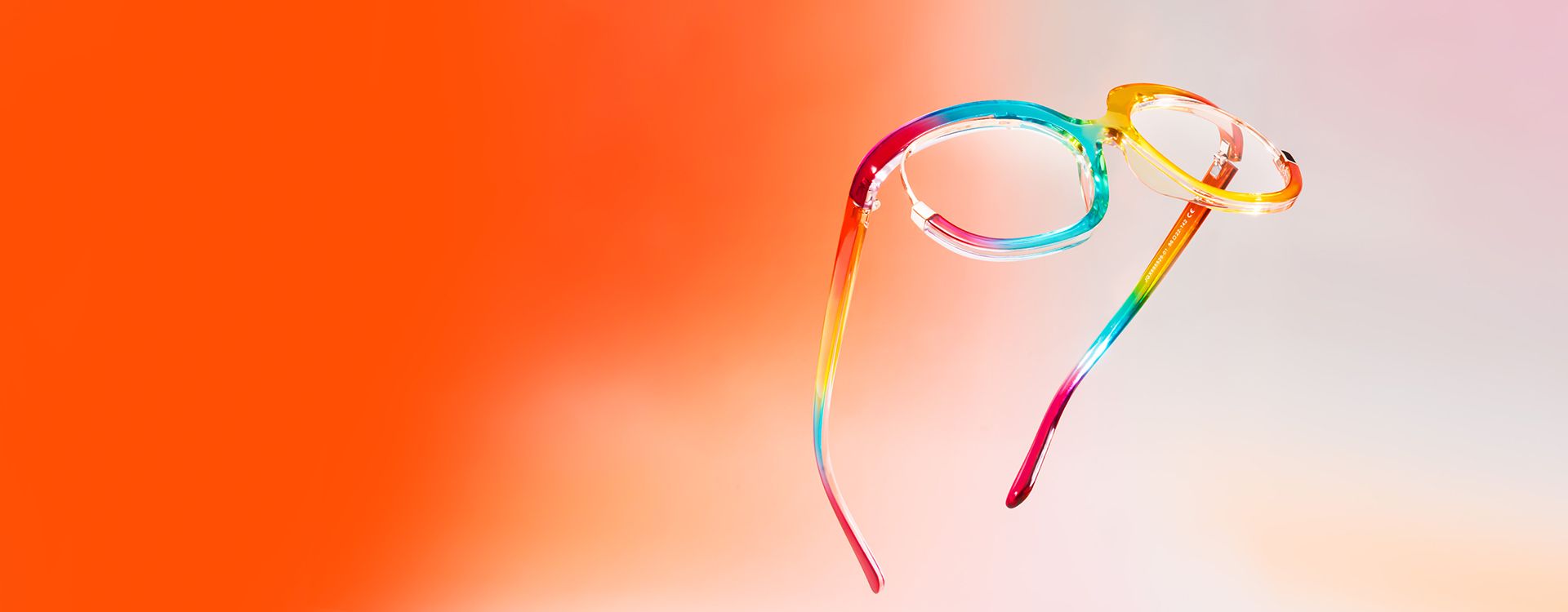 Futuristic glasses with vibrant, geometric patterns, set against a neon-lit, futuristic cityscape.