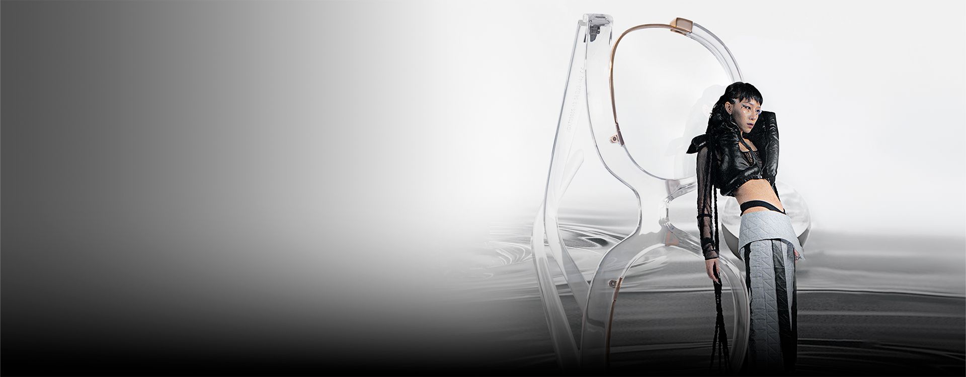 Innovative avant-garde glasses with unique clear frames, paired with a fashion-forward model for a striking visual impact.