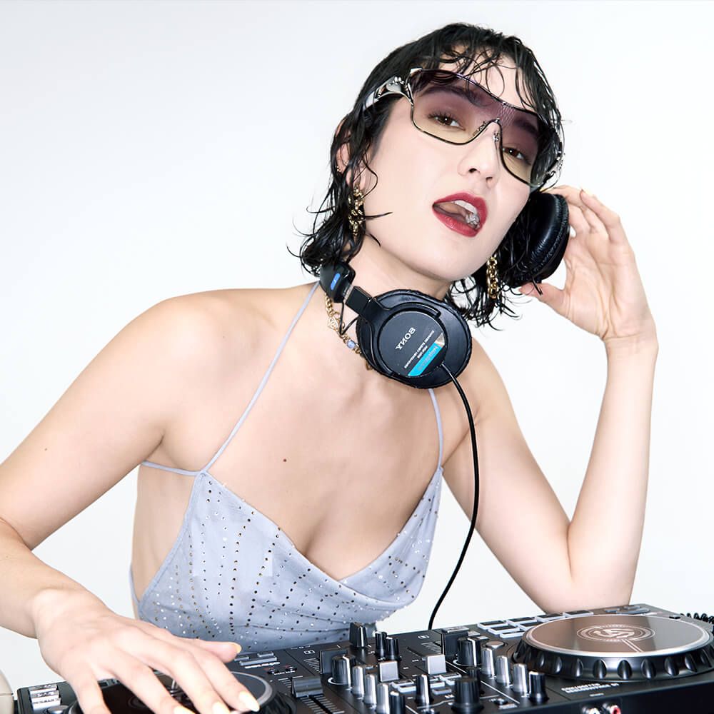 Mona Matsuoka wearing the Collision Suzuka - Pearlescent White Fashion Shield Shades | Vooglam Limited Designer Eyewear