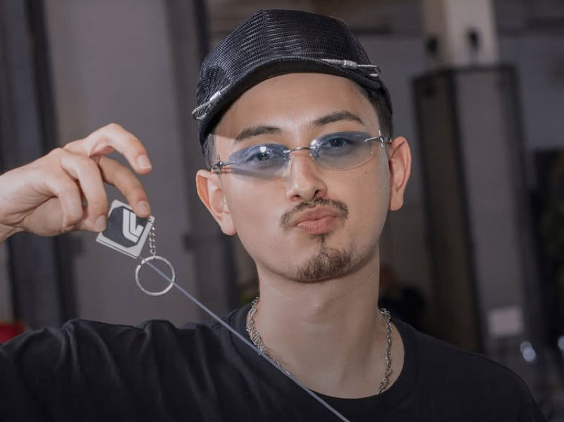 Tombogo wearing limited edition glasses