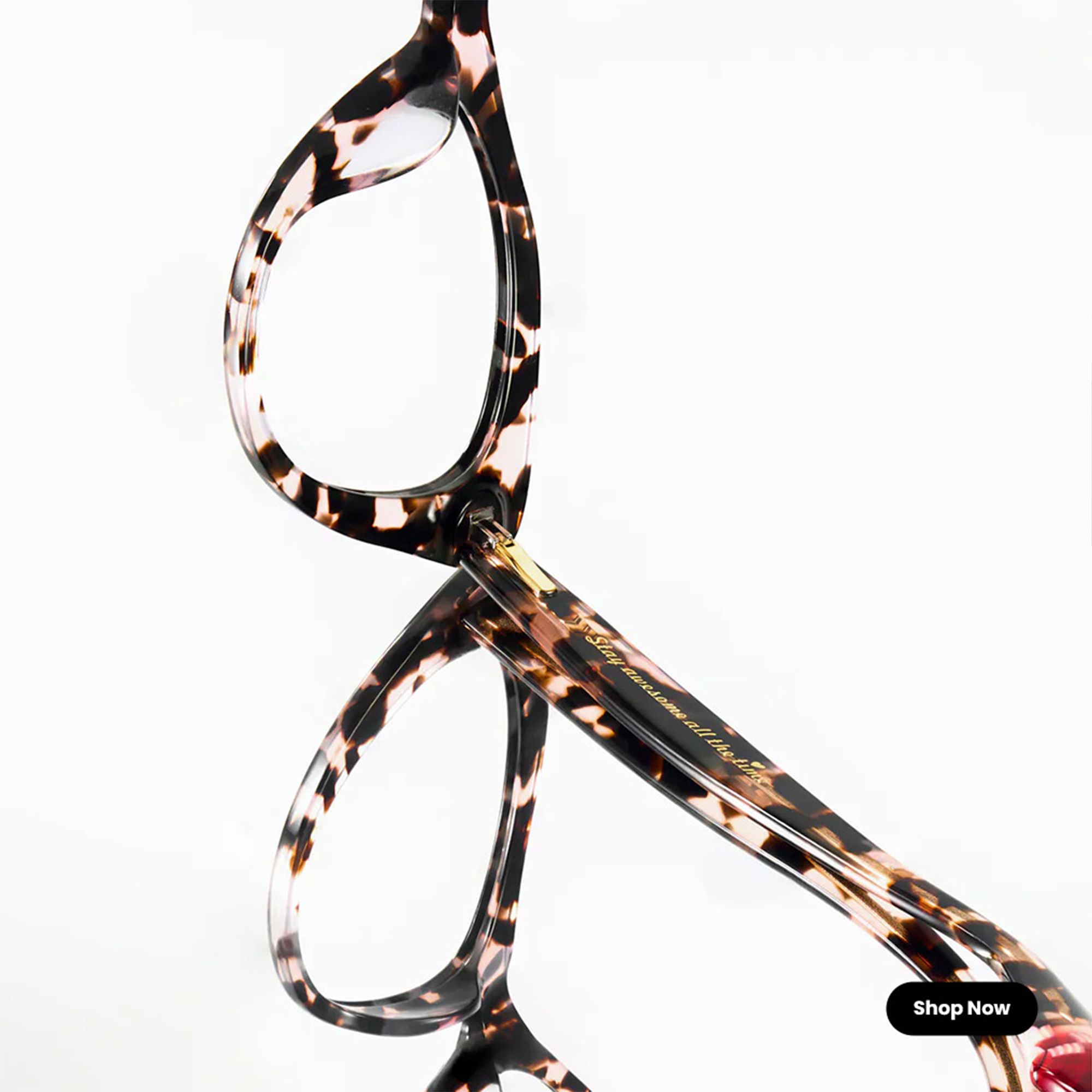 tortoiseshell cat-eye eyeglasses, showcasing the frame pattern and temple detail