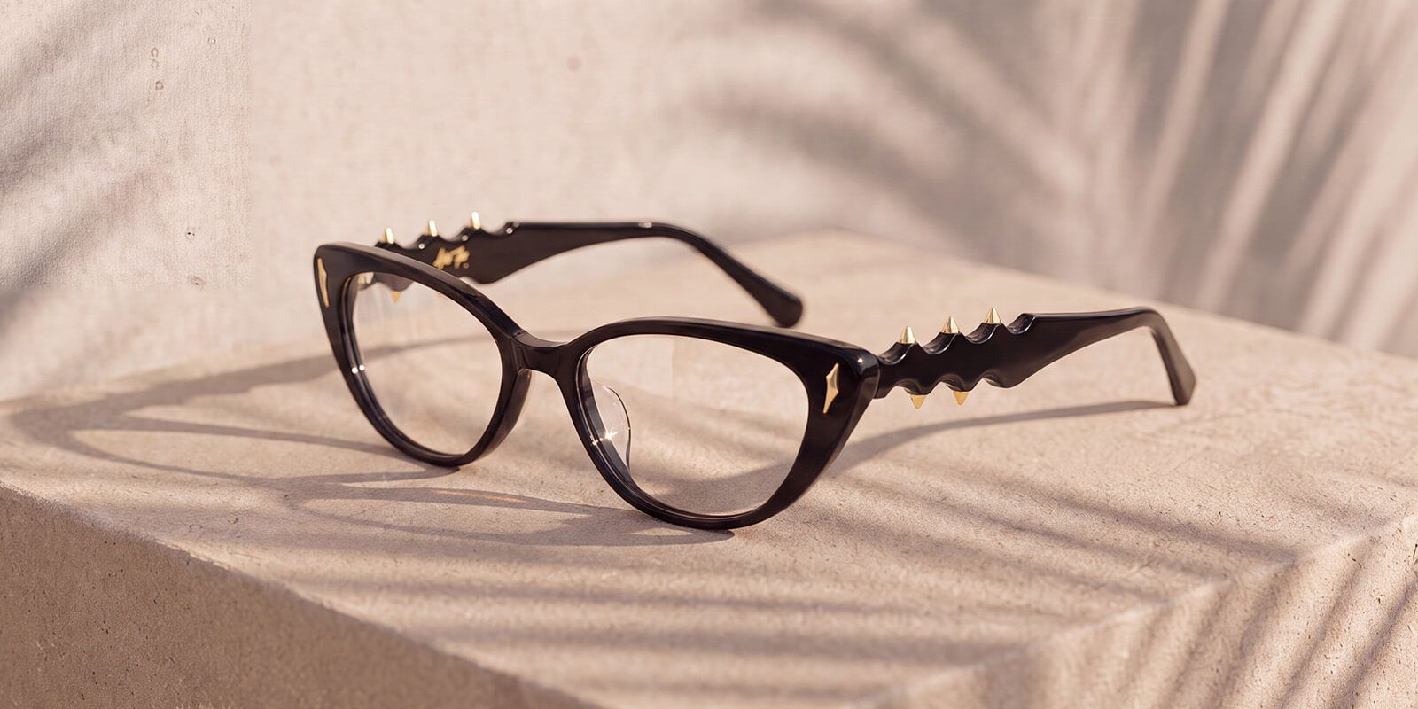 black pierecing chunky cateye glasses