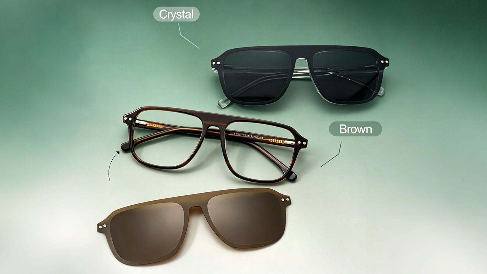 Elegant display of brown aviator glasses with magnetic clip-on sunglasses on a green background. This image highlights the sophisticated design of the glasses with a lightweight frame and brown-tinted clip-on lenses that offer seamless integration and enhanced functionality. Ideal for those seeking a stylish yet practical solution for transitioning between different lighting environments.