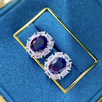Contemporary Sapphire Blue Oval Pierced Earrings | Vooglam On Model 2
