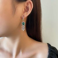 Pretty Emerald Green Rectangle Pierced Earrings | Vooglam On Model 2