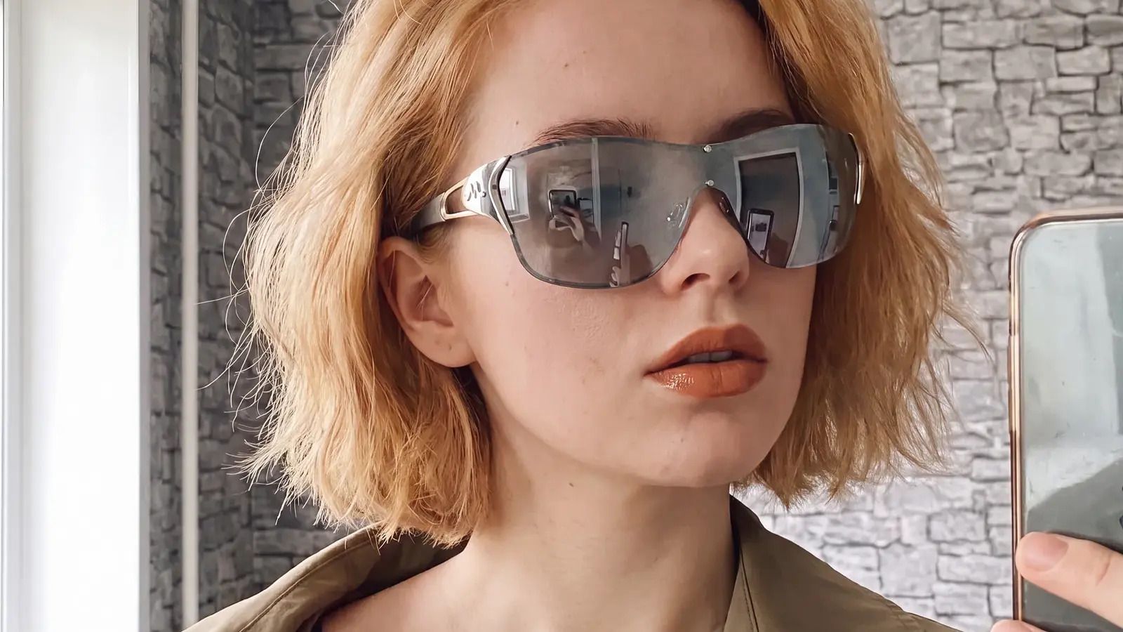 woman with one field geometric sunglasses