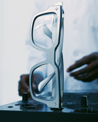 tombogo x vooglam limited edition eyewear collection silver frame standing on an electronic console