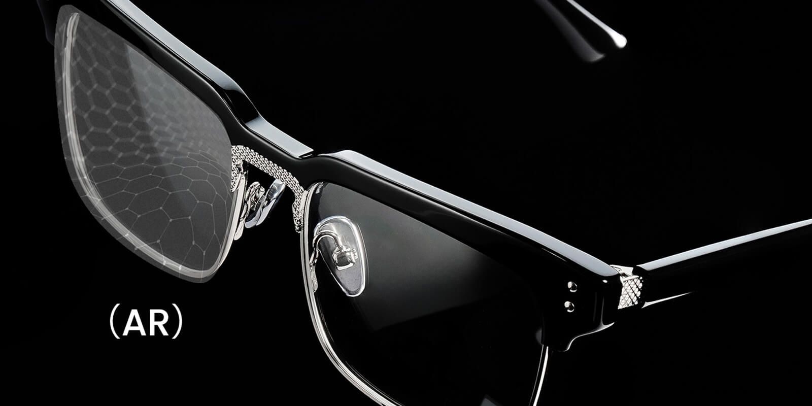 Close-up of eyeglasses with anti-reflective lenses, highlighting the reduction of glare and reflection.
