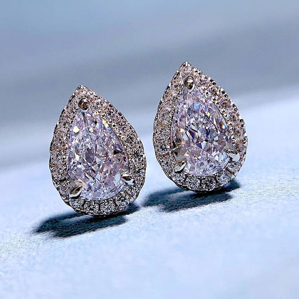 Graceful Diamond White Waterdrop Pierced Earrings | Vooglam On Model 1