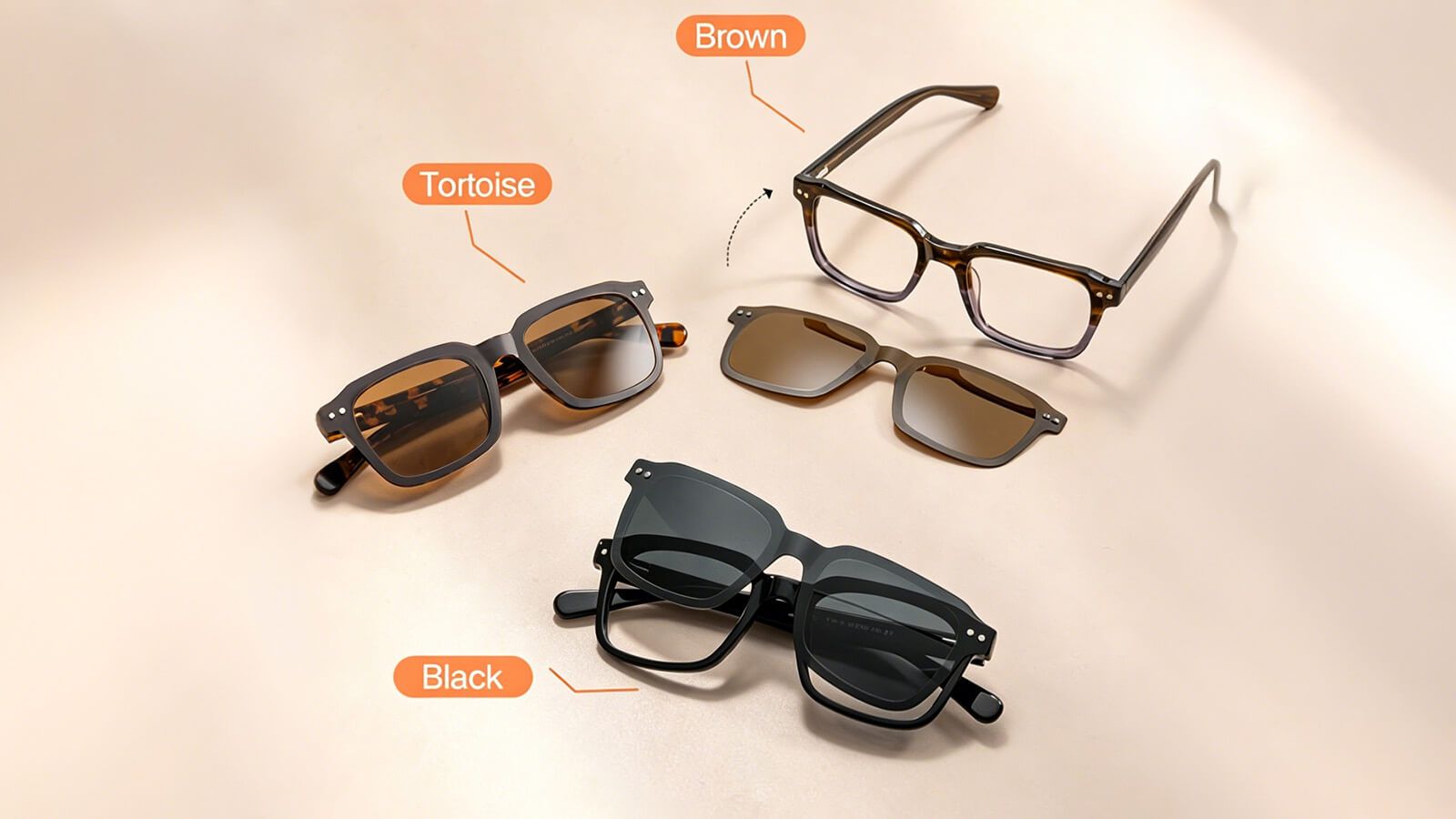 A collection of magnetic clip-on glasses featuring different frame colors and styles laid out on a beige surface. The image showcases three pairs of glasses with magnetic clip-on sunglasses in tortoise, brown, and black frame options, each labeled with their color for easy identification. The versatile and stylish designs cater to various personal preferences and are suitable for both indoor and outdoor use.