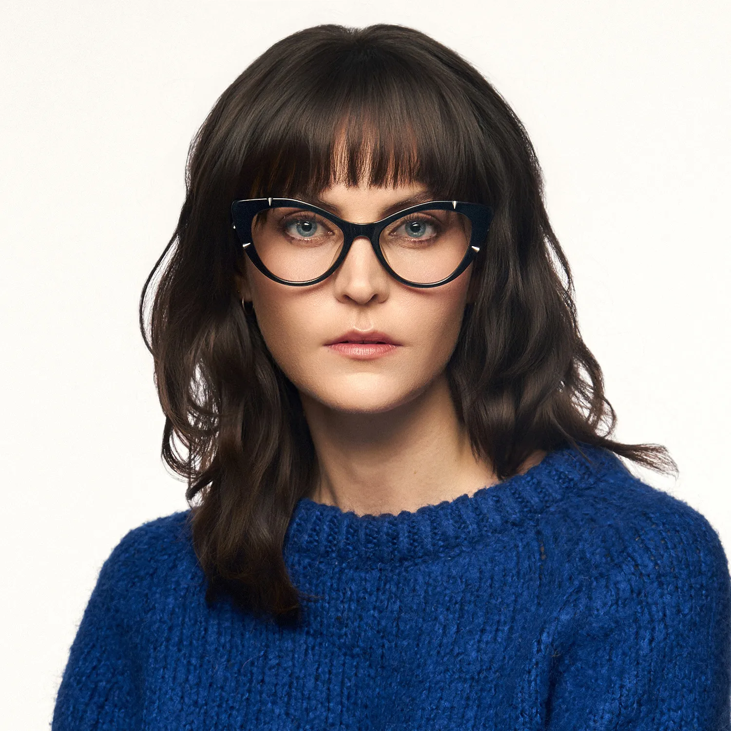 woman with gothic black spike cat eye glasses