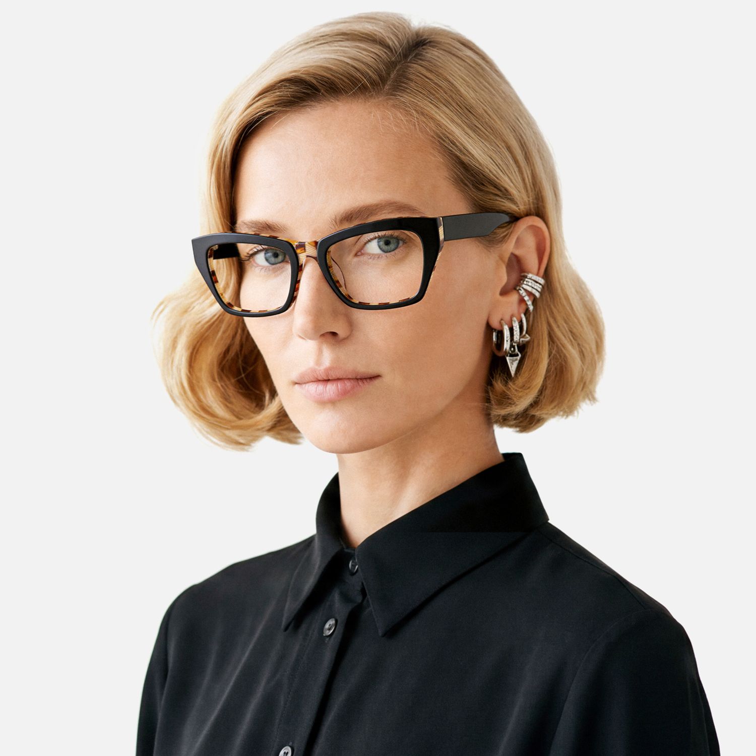 Explore the design story of Lola - Rectangle Black Eyeglasses | Vooglam