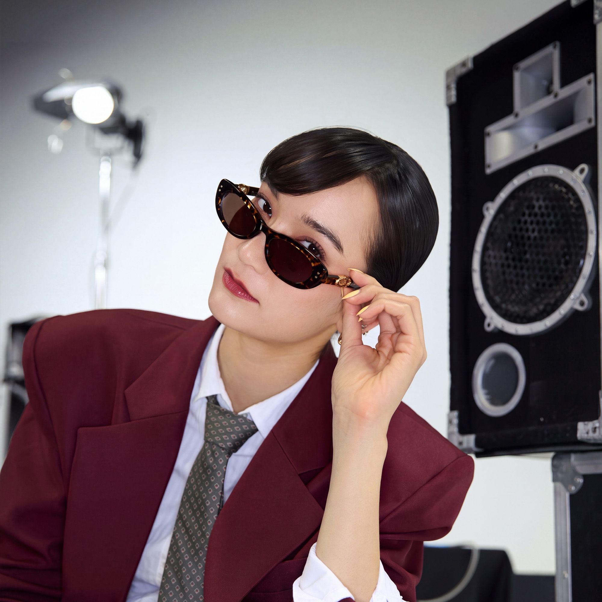 Vooglam x Mona Artist Collection: Narrow glossed cat-eye. Rotating M hinge sets the city pace.