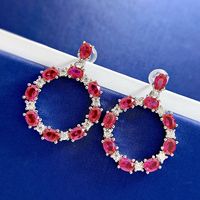 Hollowed-Out Ruby Red Pierced Earrings | Vooglam On Model 2