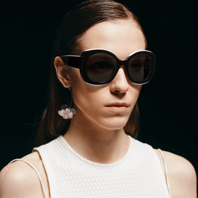 woman in oversized glasses