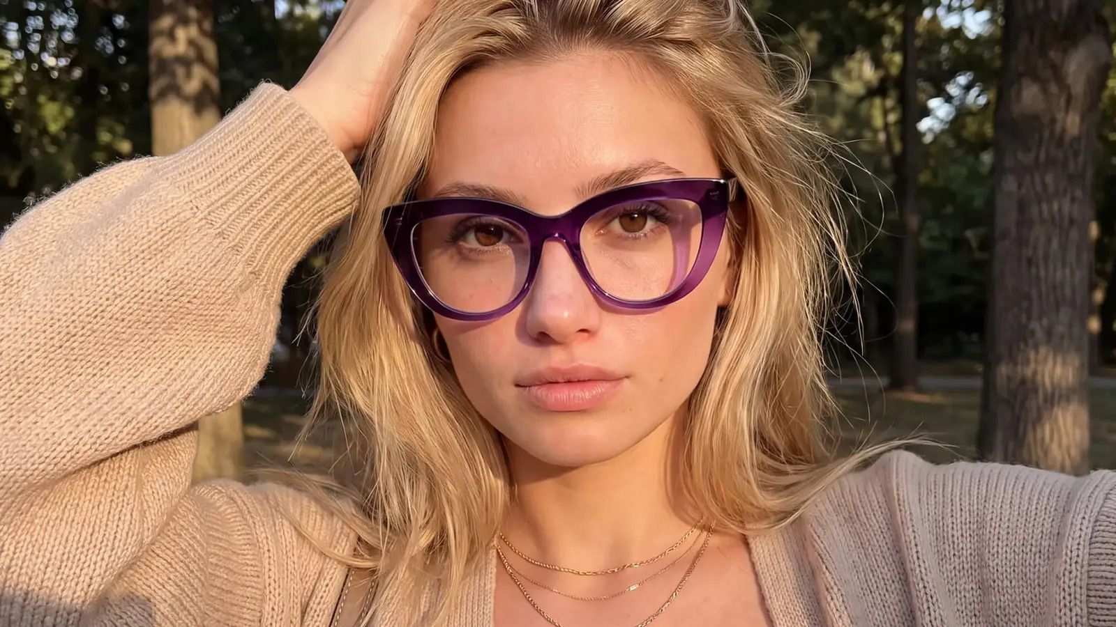 a diamond face shape woman with purple cat eye glasses