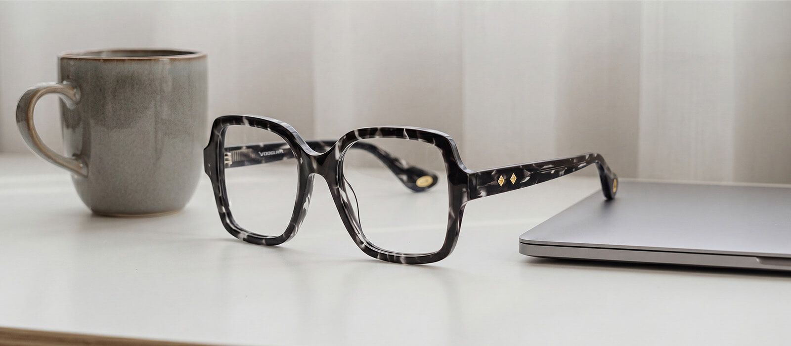 black and white tortoise eyeglasses