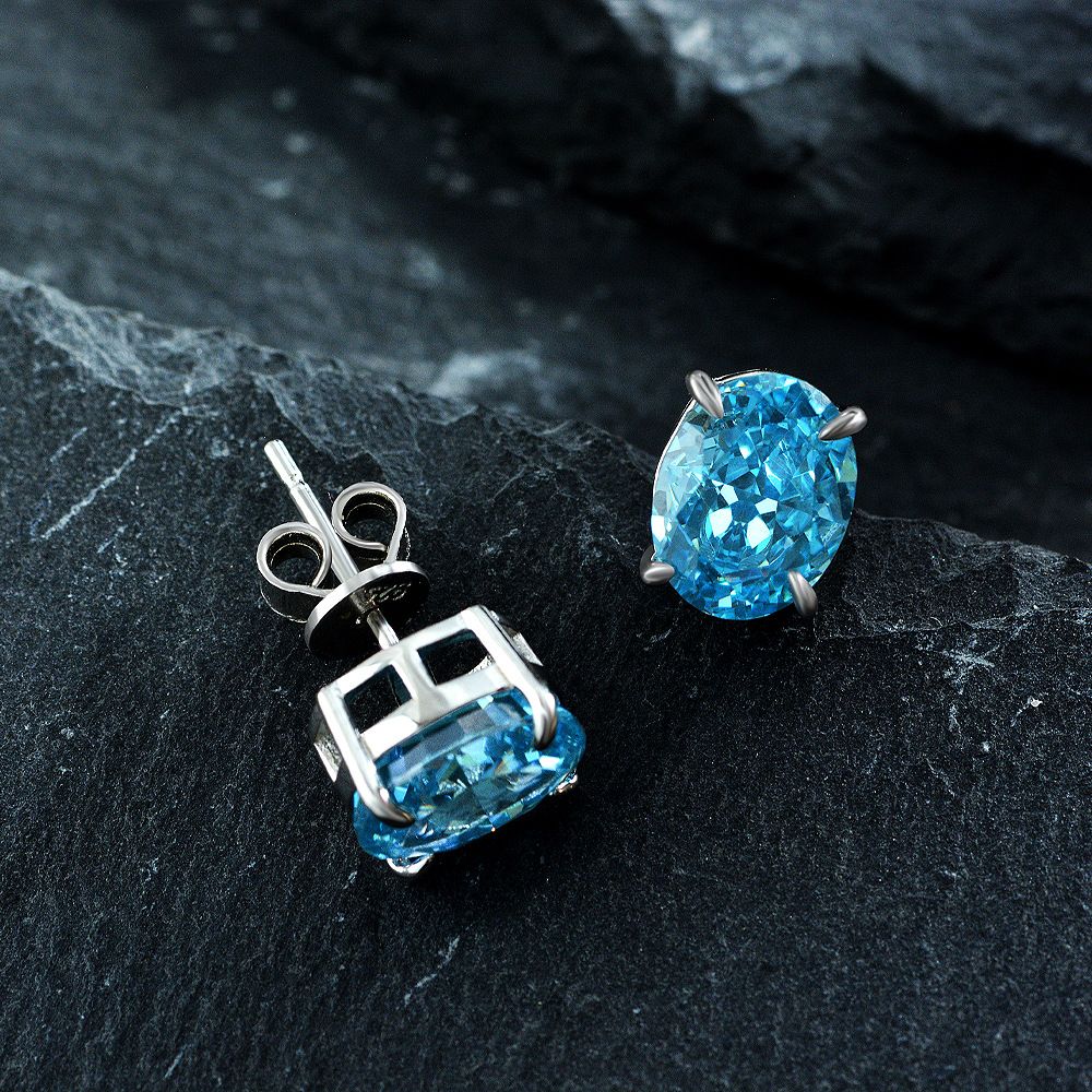 Simple Sapphire Blue Oval Pierced Earrings | Vooglam On Model 2