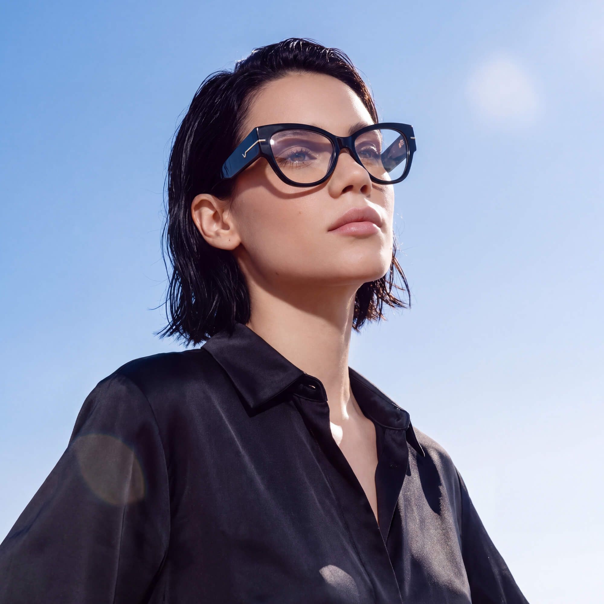 Explore the design story of Elektra - Elegant Black & Gold Cat Eye Glasses | Vooglam