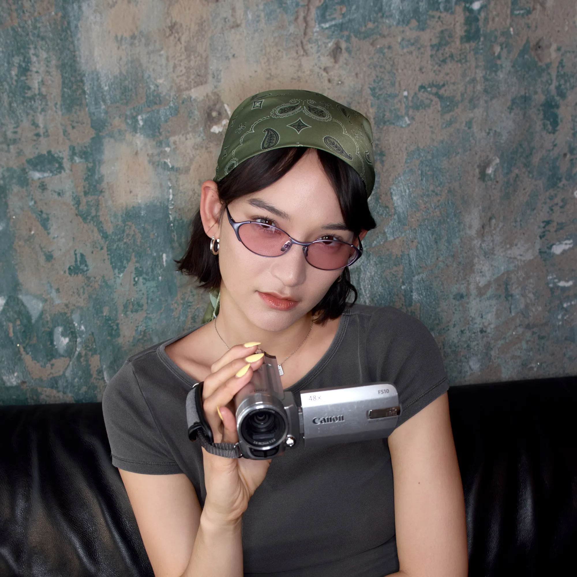 mona matsuoka with blue oval pink tinted shades