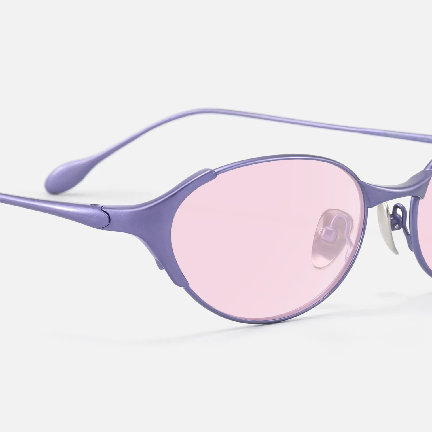 rimmed silver oval pink tinted sunglasses