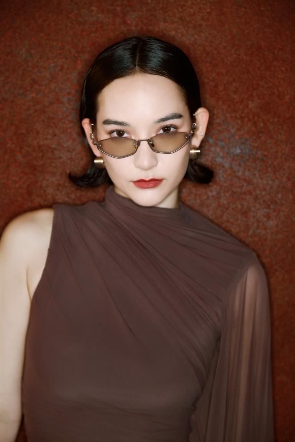Explore the design story of Niseko - Rose Gold Octagon Brown Tinted Sunglasses | Vooglam