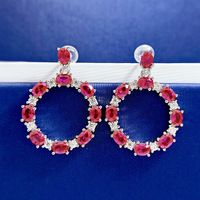 Hollowed-Out Ruby Red Pierced Earrings | Vooglam On Model 1