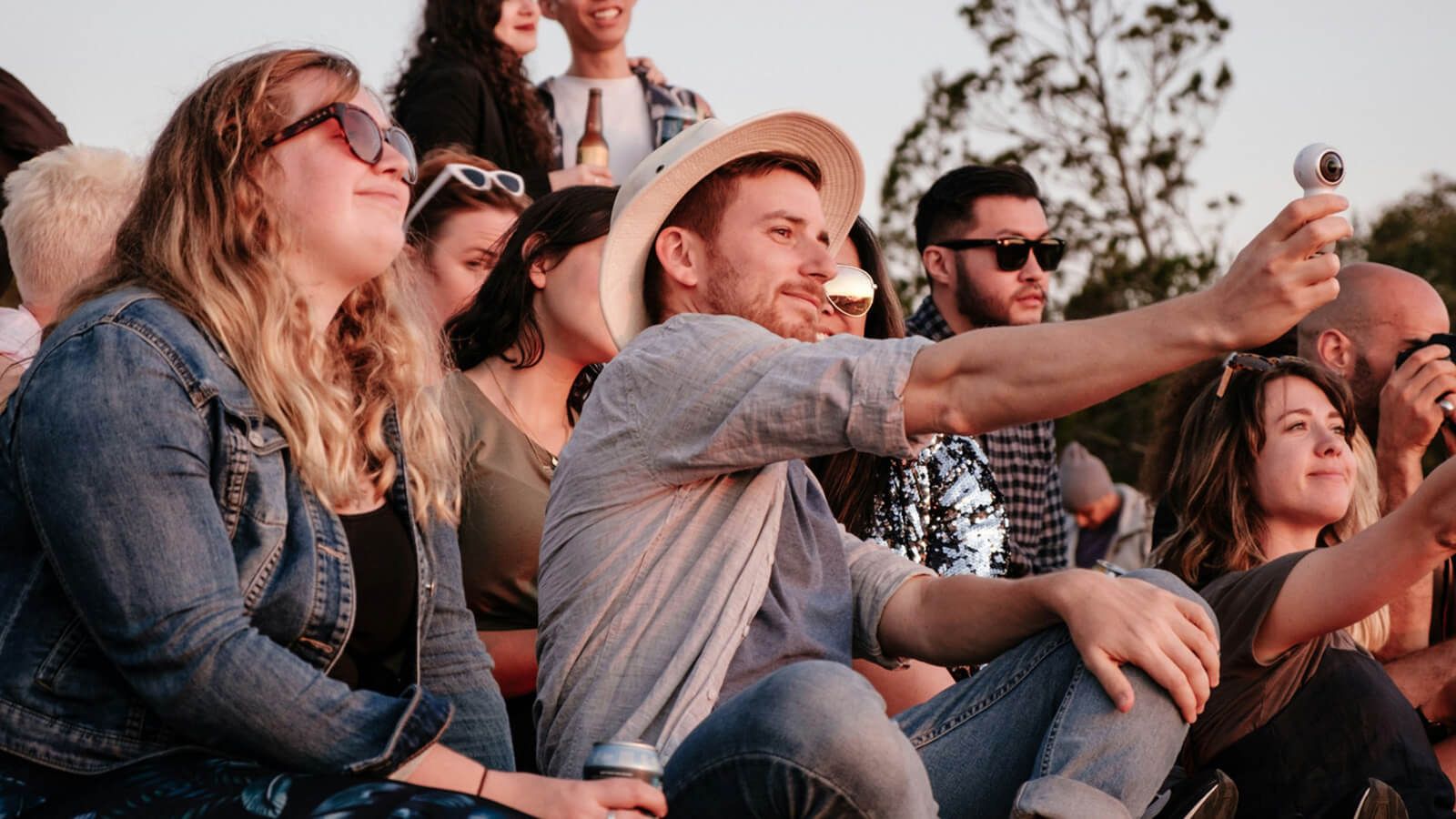 fans wearing oversized prescription rave glasses at a sunny music festival for the perfect day look