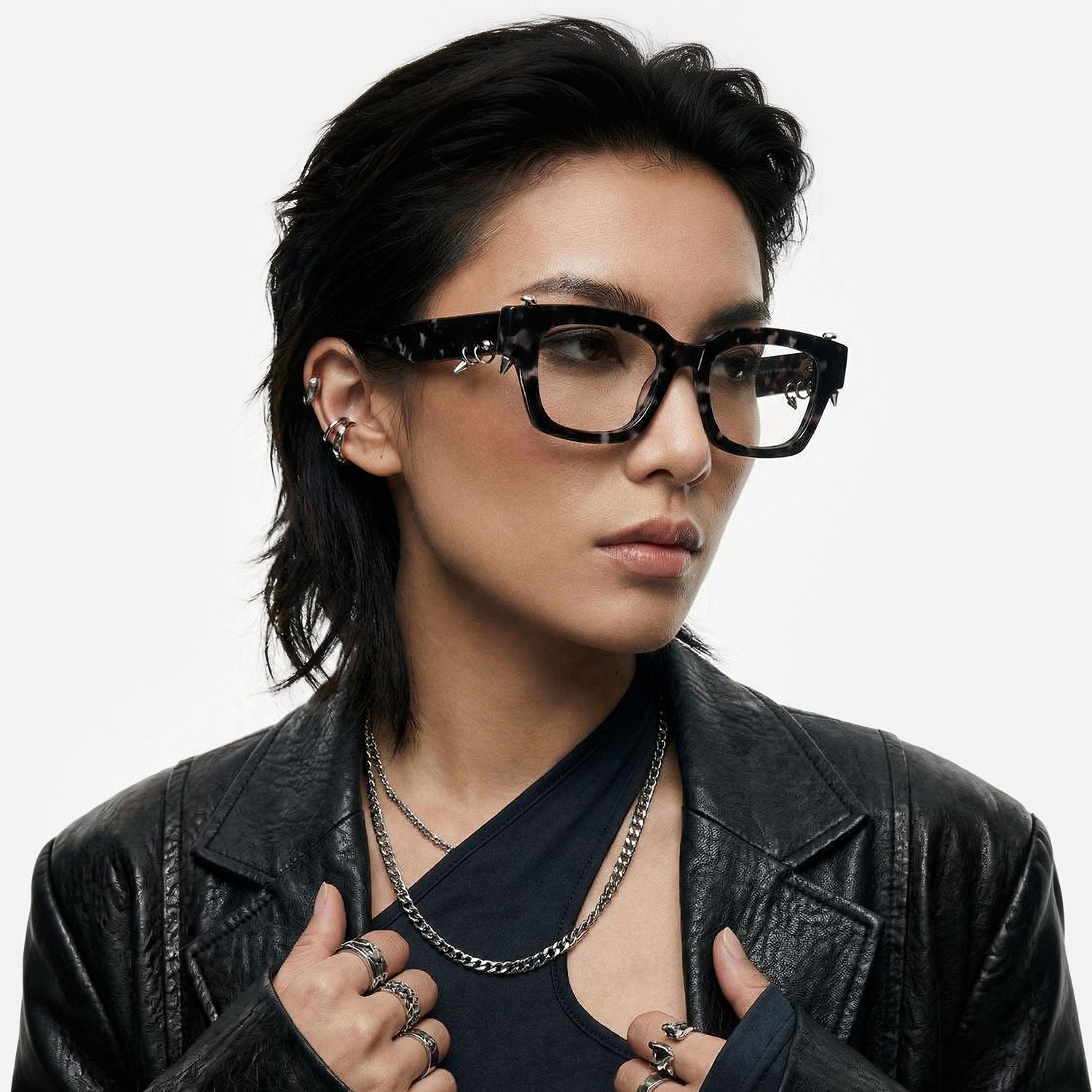 Explore the design story of Sabrina - Black Pierced Tortoise Glasses | Vooglam