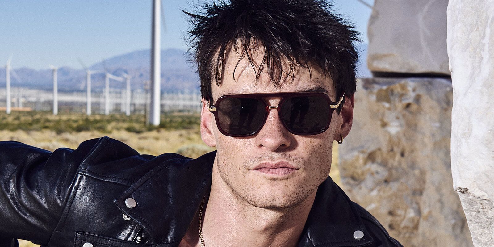 a man wearing wayfarers sunglasses