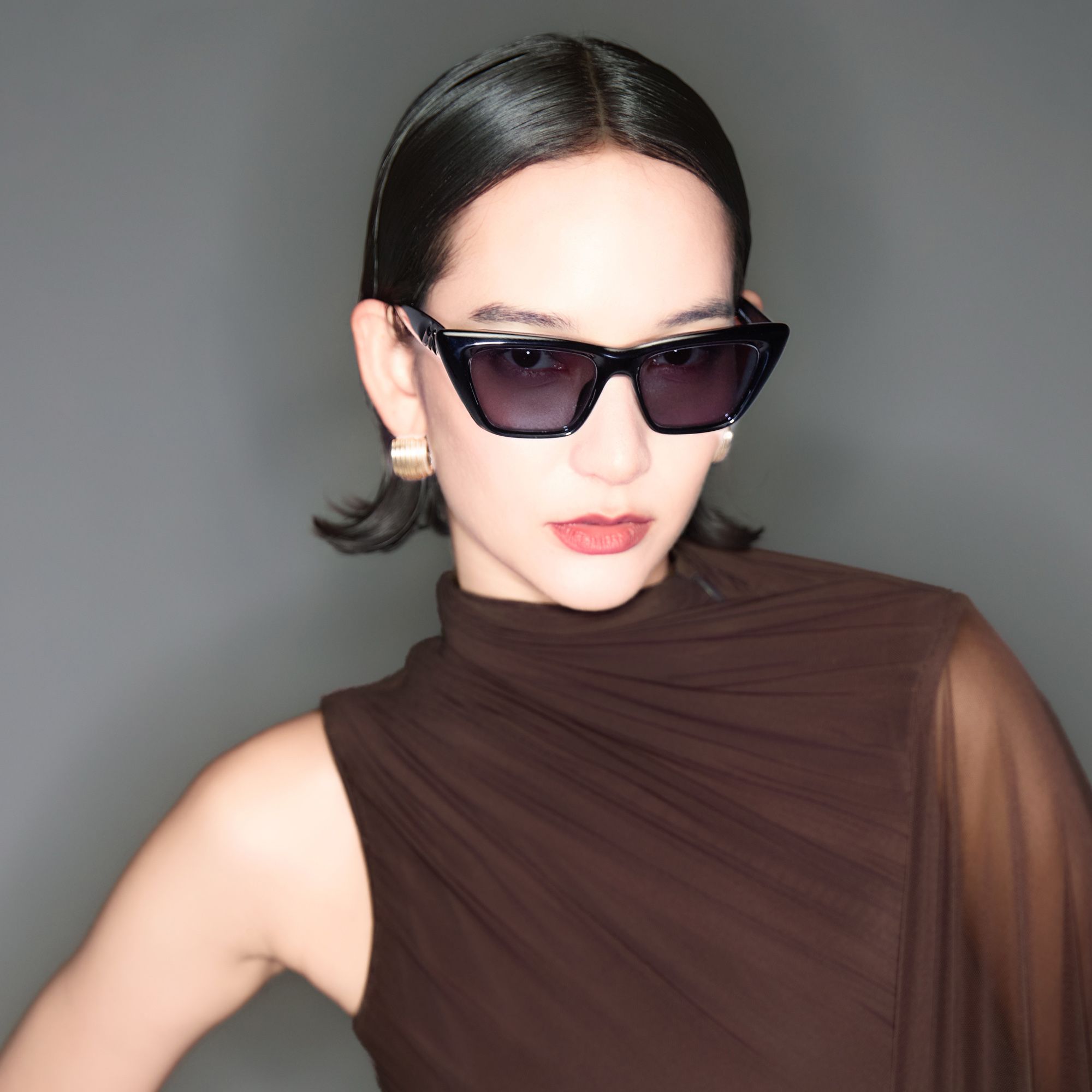 Explore the design story of Meguro - Inflated Black Cat Eye Rx Glasses | Vooglam