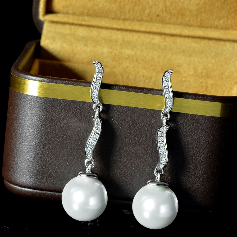 Unique Shiny Diamond White Pierced Earrings by Vooglam - On Model