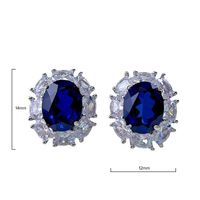 Contemporary Sapphire Blue Oval Pierced Earrings | Vooglam Angle View