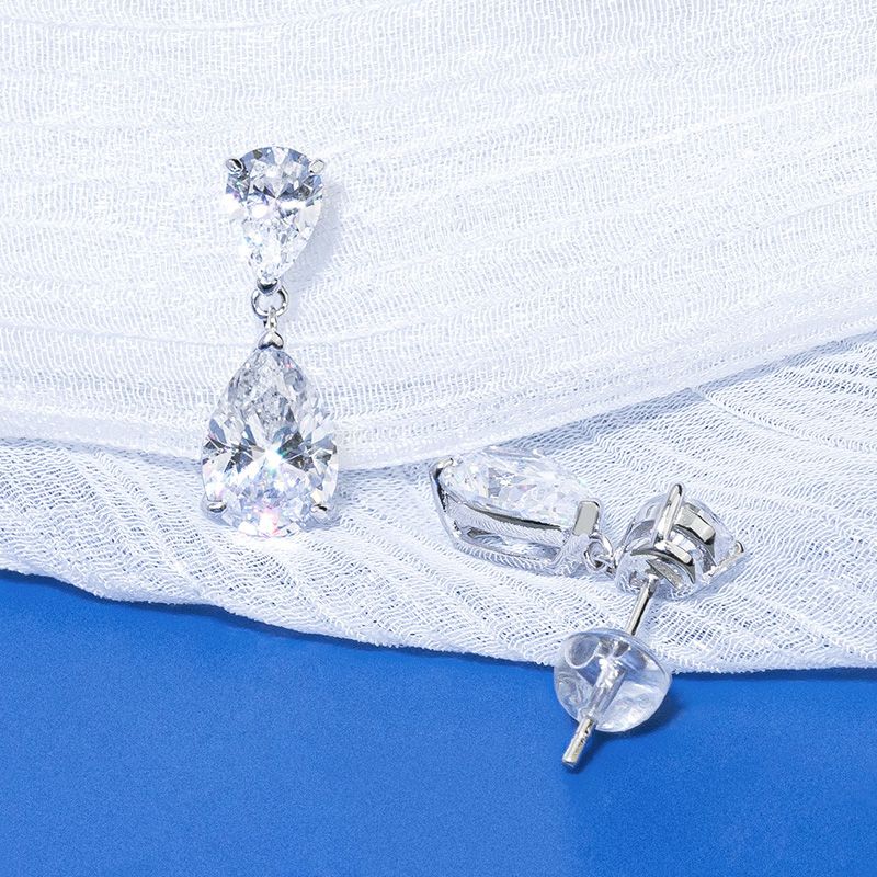 Stylish Diamond White Waterdrop Stud Pierced Earrings by Vooglam - Lifestyle Look