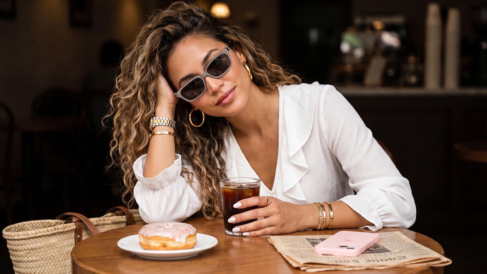 woman wearing grey rectangle sunglasses with minimalist outfit